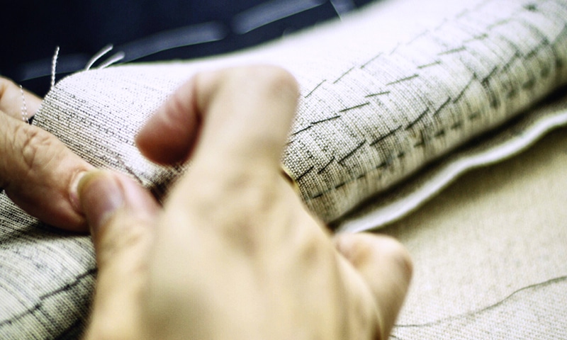 Michael Andrews Bespoke Experience - Hand stitching fabrics