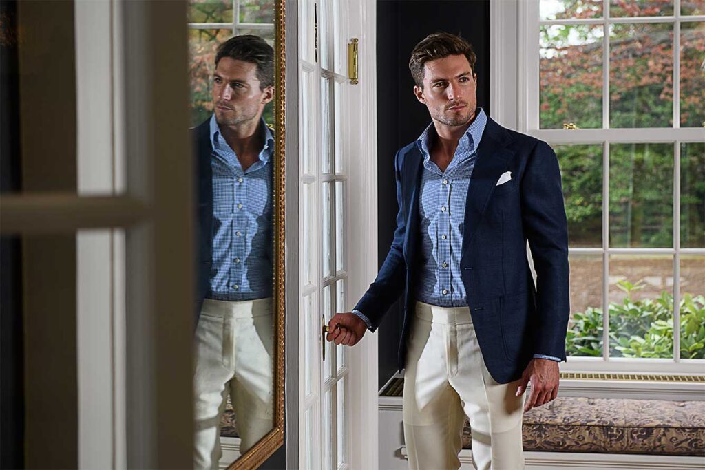 Bobby in navy blazer, light blue dress shirt