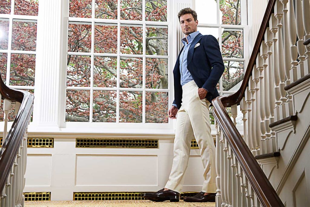 Close-up view of cream pants