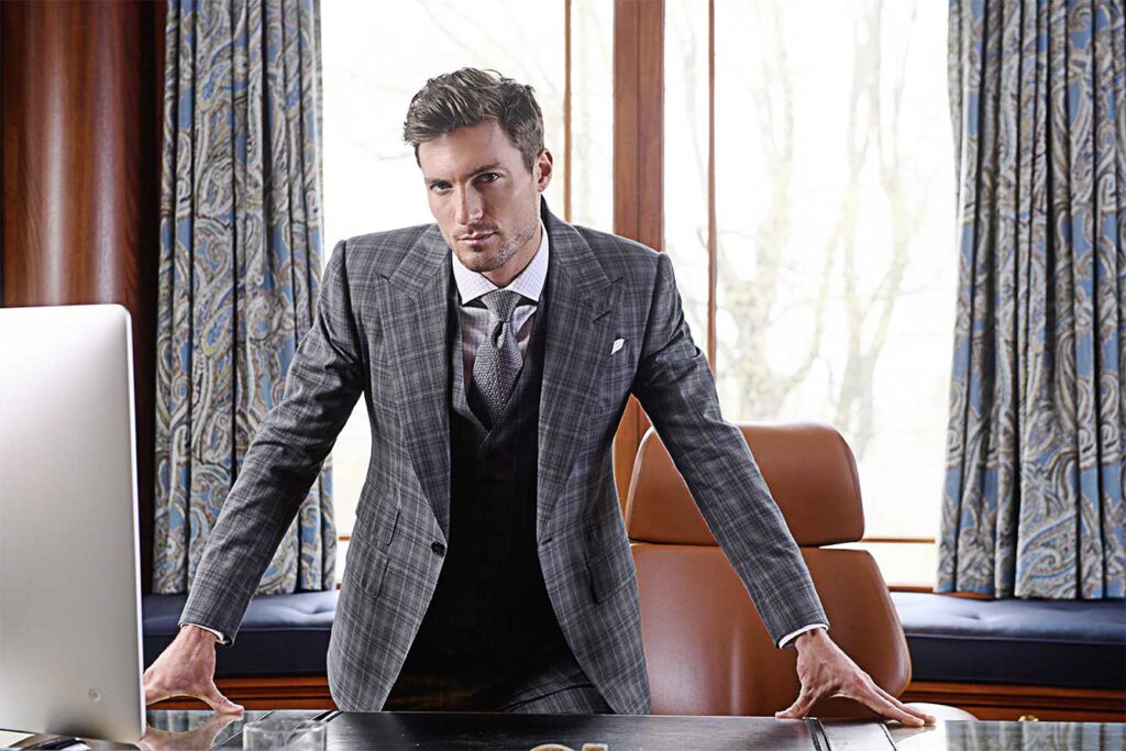 Bobby in custom dark grey plaid suit