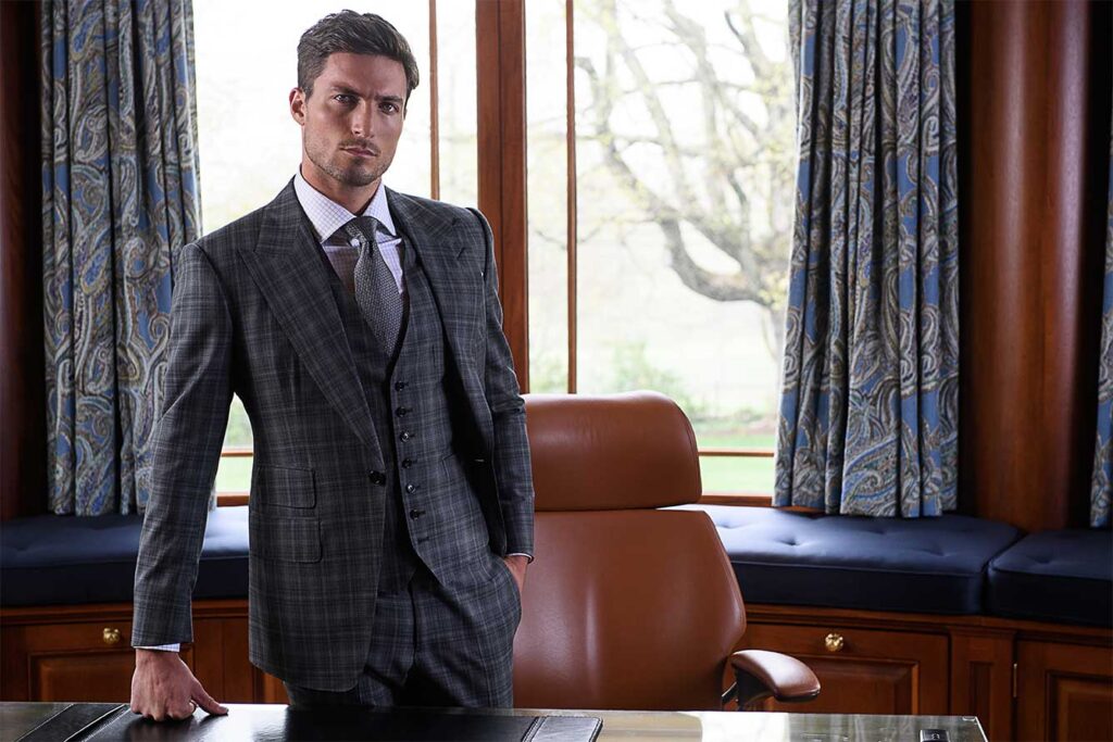 Bobby in custom dark grey plaid suit