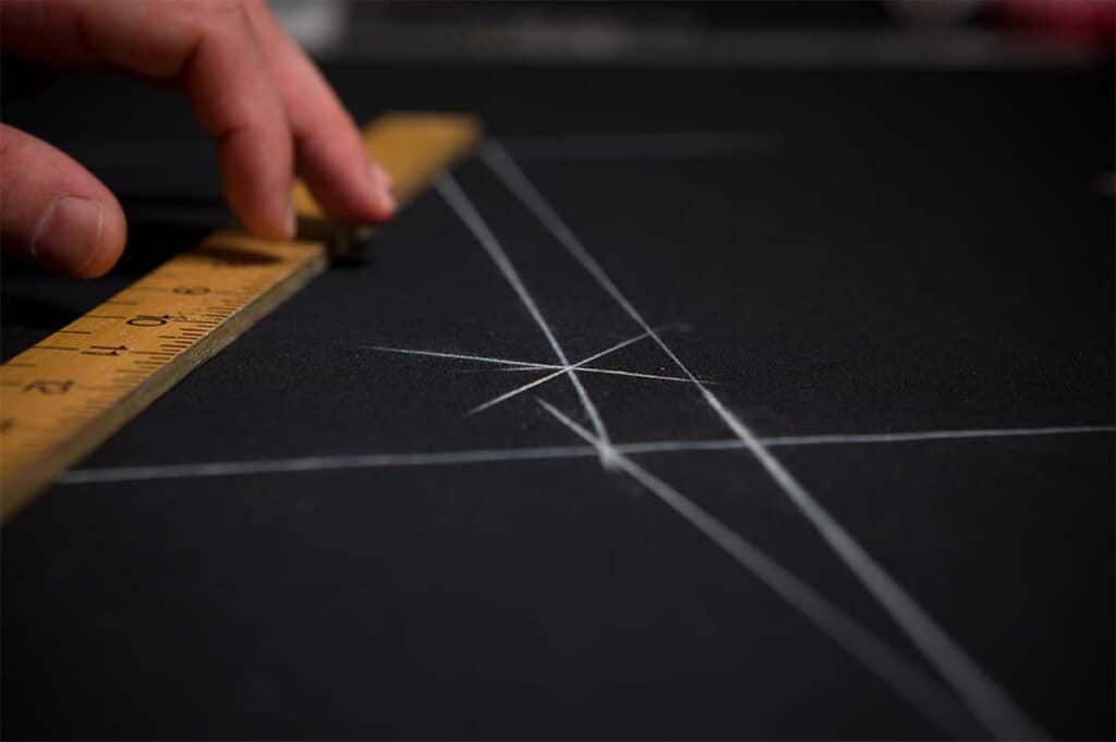 Michael Andrews Tailoring Process - Tailor marking fabric