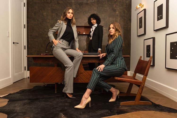 Press image of three women in suits, thumbnail