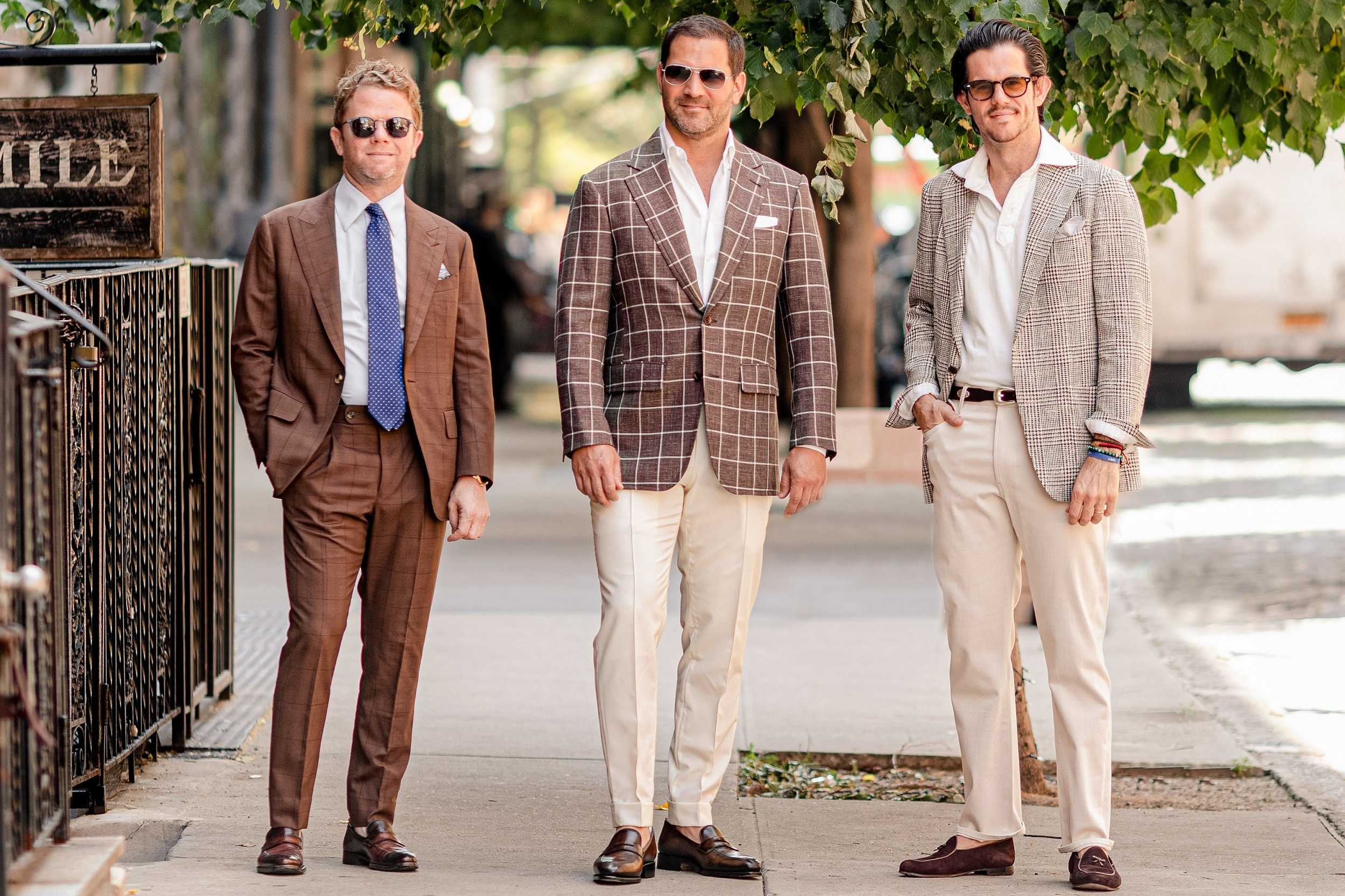 MAB team in custom blazers pose outdoors MAB team in custom blazers pose outdoors