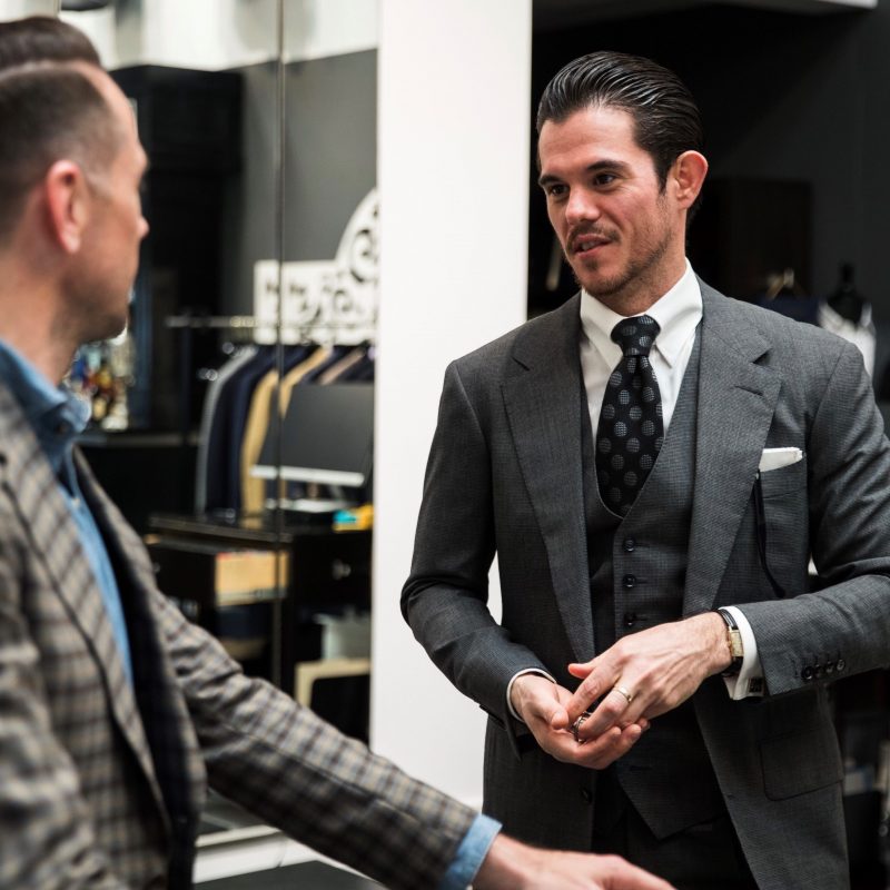 Cory speaking with a client - custom suits nyc bespoke tailor midtown, noho