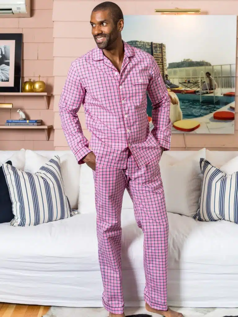 Man wearing pink checkered pajamas