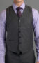 Full view of grey sharkskin MTM suit vest styled with a lilac shirt and burgundy tie