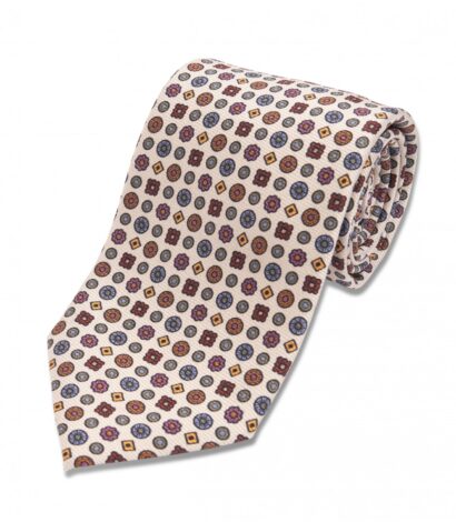 (product) Ivory with Blue, Orange, Green Small Medallion Silk Necktie, Rolled