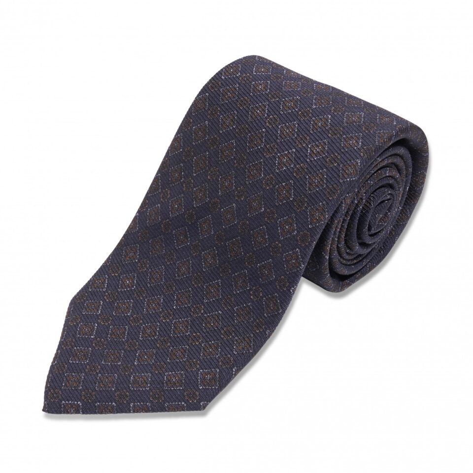 (product) Navy with Brown Medallion Silk Necktie, Rolled