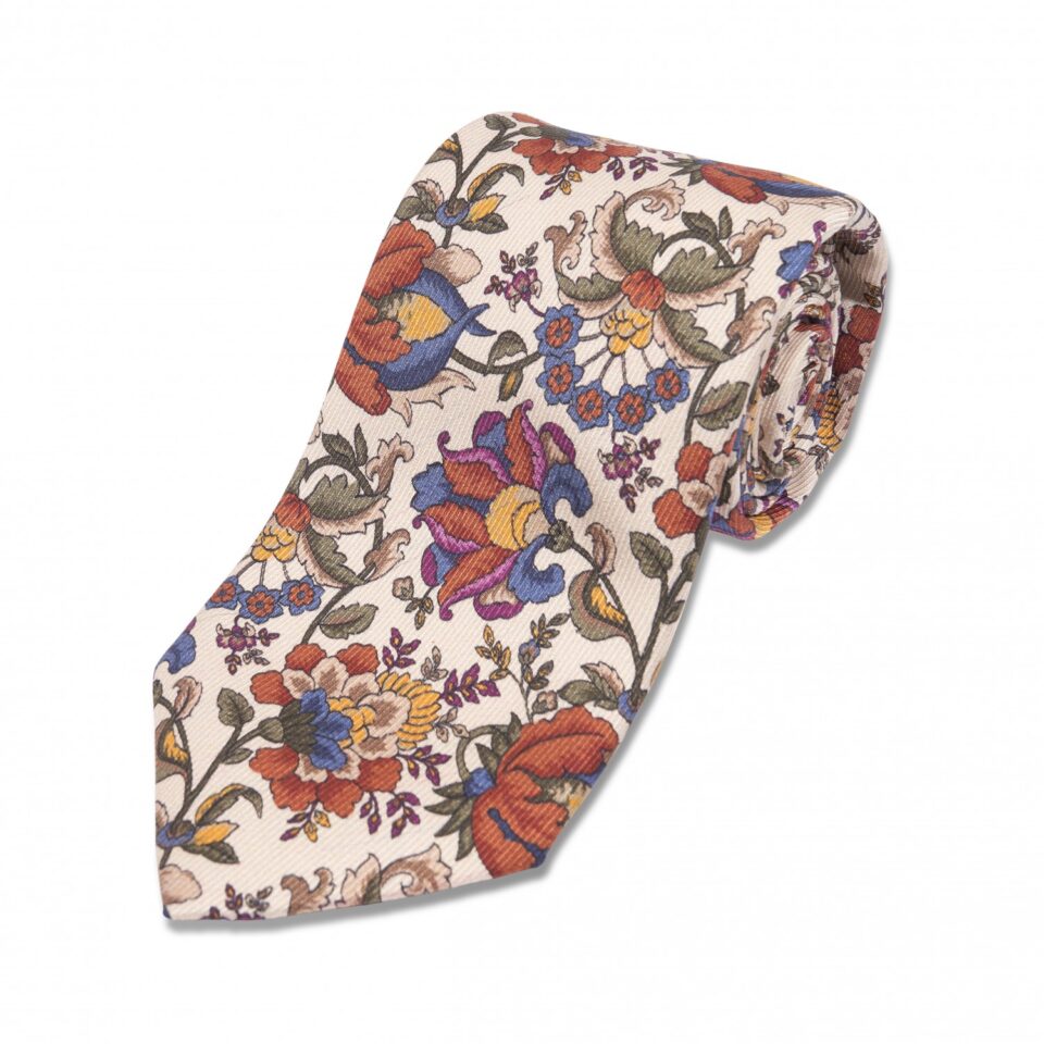(product) Ivory with Blue, Orange, Green Floral Silk Necktie, Rolled