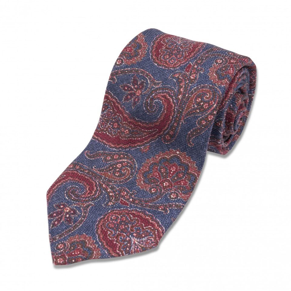 (product) Navy with Red & Brown Paisley Silk Necktie, Rolled view