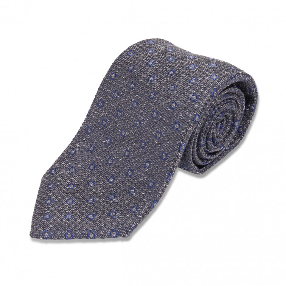 (product) Grey with Blue Medallion Silk Necktie, Rolled view