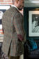 (product) Green With Multicoloured Overchecks Shooting Jacket, side view with suede elbow patches