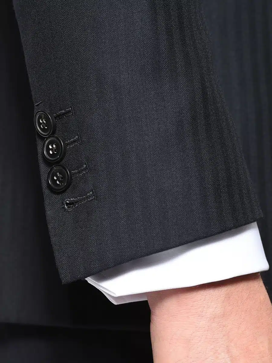 (product) Navy Herringbone Bespoke Suit, cuff detail