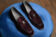 (product) Vomero Velvet Prugna Formal Loafer, Top view of the pair