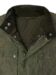 Detail view of a trailmaster jacket showcasing the collar and quilted lining with buttons