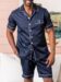 (product) Navy Pajama Shorts with matching navy pajama top, shown on a model