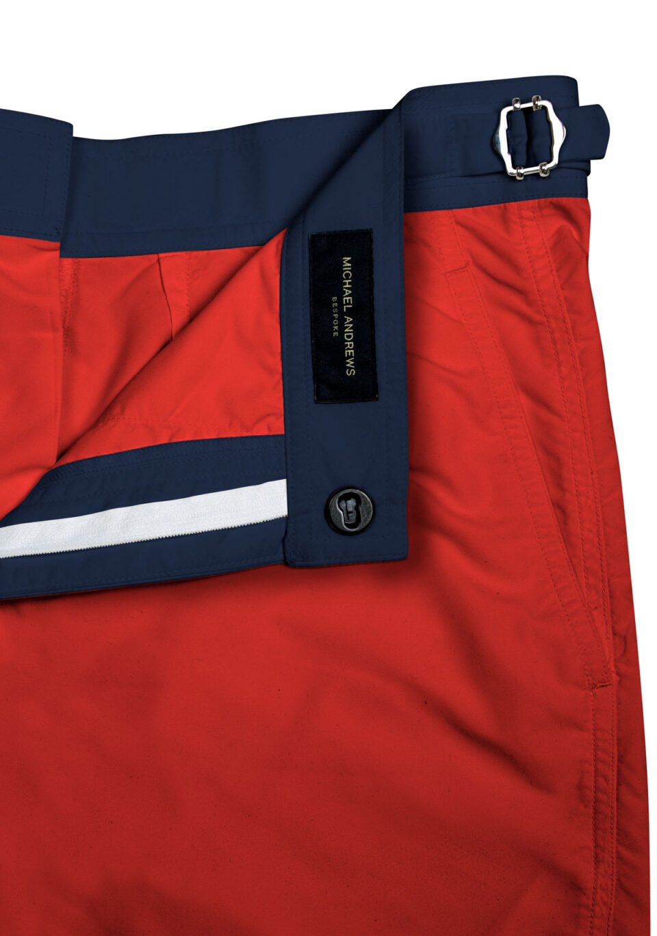 Red Swim Shorts with Navy Waistband, close-up view
