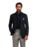 Model wearing a black silk cashmere long-sleeve polo paired with a black blazer and grey trousers