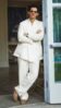 Cory wearing off white linen suit