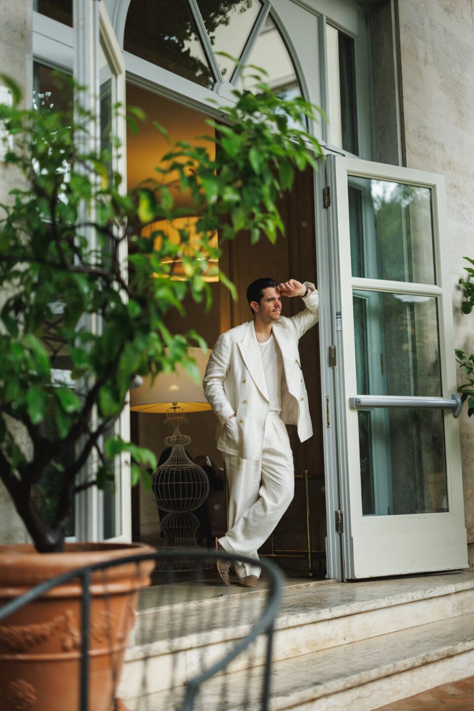 Cory in an off white linen suit