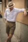 Summer outfit featuring a white camp shirt and tailored Solaro shorts, custom made by Michael Andrews Bespoke