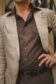 Close-up of a tan linen sport coat layered over a brown dual-pocket shirt - custom suits nyc bespoke tailor midtown, noho