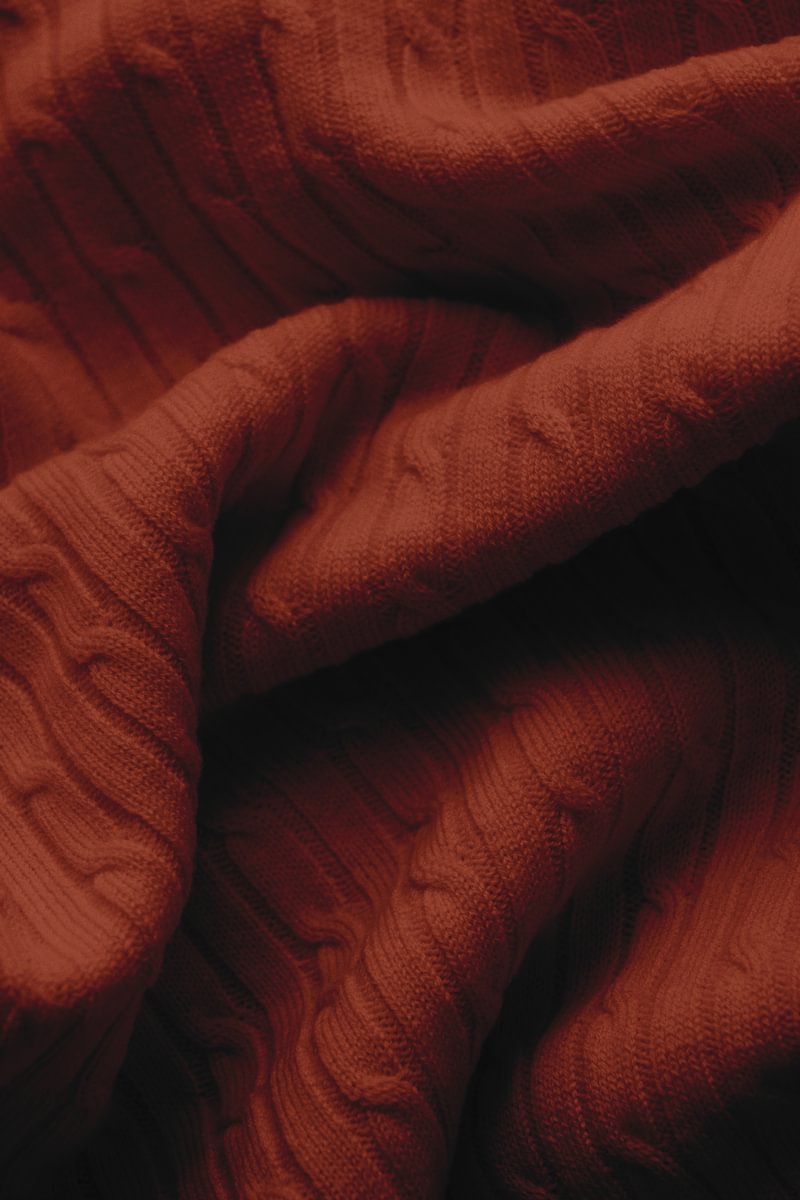 detailed view of a cable knit sweater
