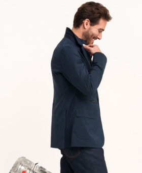 Model wearing traveler jacket - custom suits nyc bespoke tailor midtown, noho