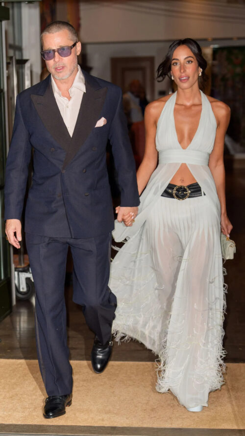 Brad Pitt wearing navy double-breasted tuxedo