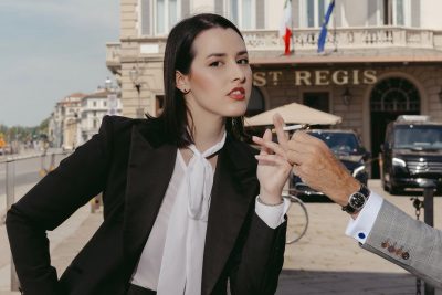 Giulia Guidi at The St. Regis Florence wearing a contemporary Le Smoking-inspired tuxedo in Dormeuil Super Brio for MAB’s 20 for 20 lookbook.