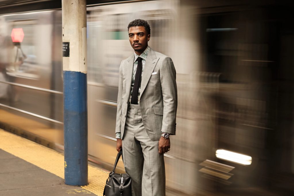 Derrick Brownie wearing a light grey suit in Dormeuil Imperial Jade for Look No. 13 of Michael Andrews Bespoke’s 20 for 20 lookbook.