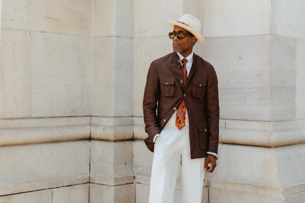 Karl-Edwin Guerre wearing Dormeuil Naturals in Washington Square Park for Look No. 10 of Michael Andrews Bespoke’s 20 for 20 anniversary lookbook.
