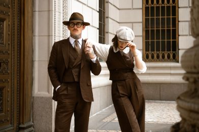 Damien and Corinne Broderick wearing coordinated brown tailored looks in Dormeuil 4 Elements for MAB’s 20 for 20 anniversary lookbook.