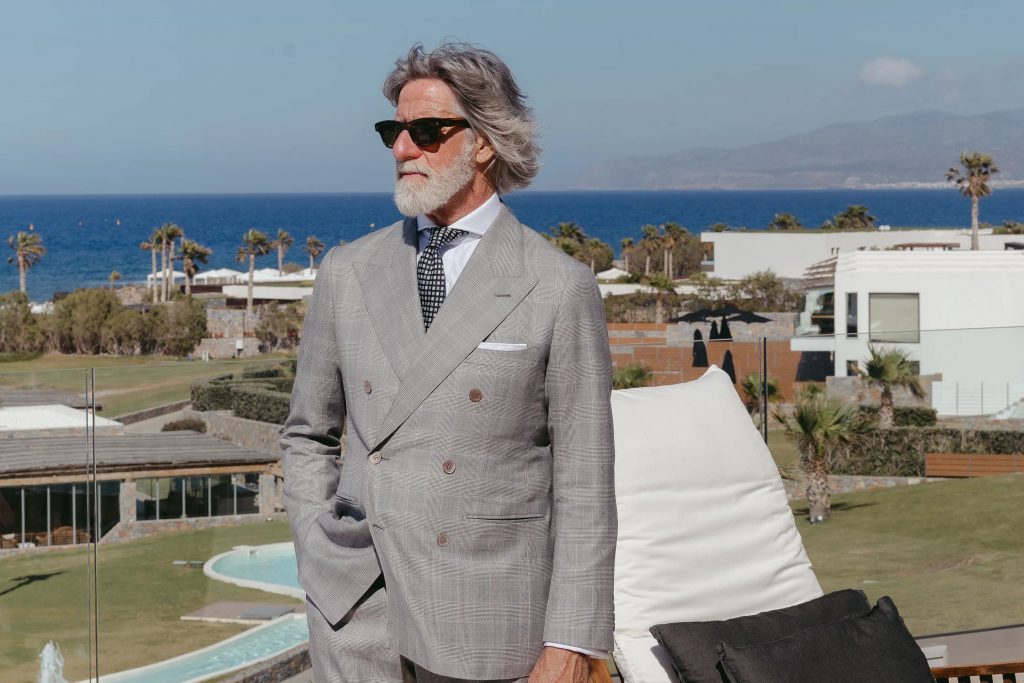 Franco Mazzetti wearing a black-and-white glen check suit with a subtle lavender overcheck in Dormeuil 15.7 for MAB’s 20 for 20 lookbook.