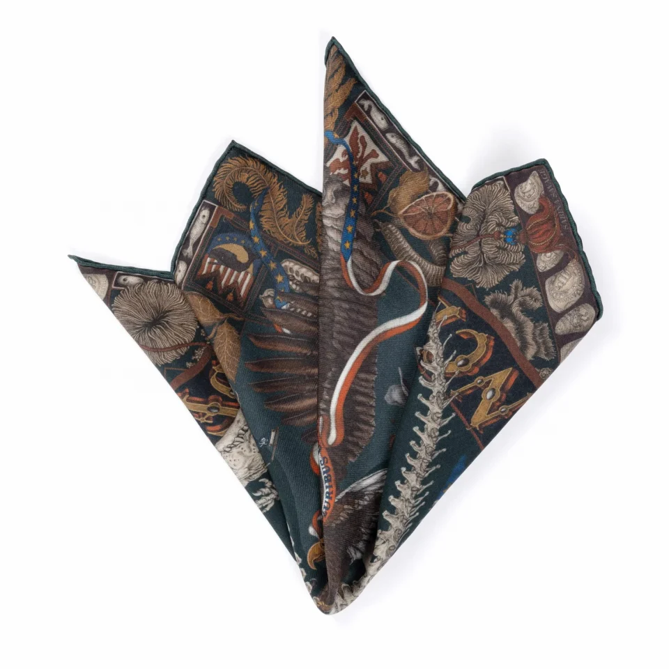 The Scrimshaw Skeleton Silk Pocket square in Kelp and Canvas by Sabina Savage - folded